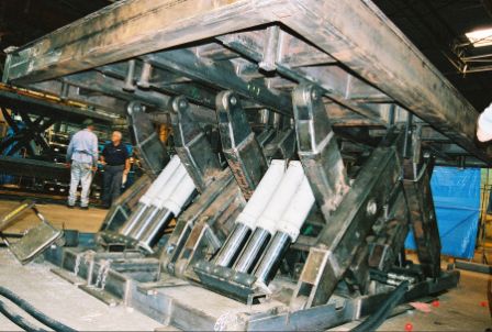 The heavy duty scissor lift features capacities of up to 120,000 lbs. The heavy duty scissor lift features capacities of up to 120,000 lbs.