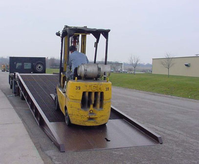 Dock yard ramps enable dock employees to quickly load and unload trucks and other vehicles.