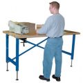 Beacon adjustable work bench raises material to an ergonomically correct working height. The adjustable work bench features a fold-away hand crank located directly under the platform for easy raising and lowering. The adjustable work bench employs a hydraulic system that raises the platform evenly. Adjustable work bench features a 750-lb. capacity.