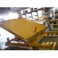 Hydraulic Tilt Tables are heavy duty in design. With deck sizes up to 120" x 120". Degree of tilt from 45 to 90 degrees. Capacities up to 6,000 lbs. The hydraulic tilt table is electric hydraulic powered by a motor pump reservoir. The unit has an adjustable limit switch to control the tilt angle. Internal high pressure gear pump with check valve, relief valve, pressure compensated flow control valve, solenoid valve, suction and return filters make the hydraulic tilt table an efficient ergonomic tilting work station piece of equipment. the hydraulic tilt table includes up to a 45 or 90 degree tilt.