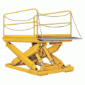 The Beacon heavy capacity scissor loading dock lift is ideal for lifting heavy objects. This hydraulic loading dock lift has a safety tread steel plate platform with 8" beveled toe guards and yellow and black safety strips. This scissor dock loading leveler features 2 removable steel handrails, positive stops on all 4 corners and hinged safety restraint maintenance bars. The hydraulic lift also features a safety velocity fuse at the base of each cylinder. The unit also has 4 safety chains with snap hooks. Loading dock lift features four safety chains with snap hooks.